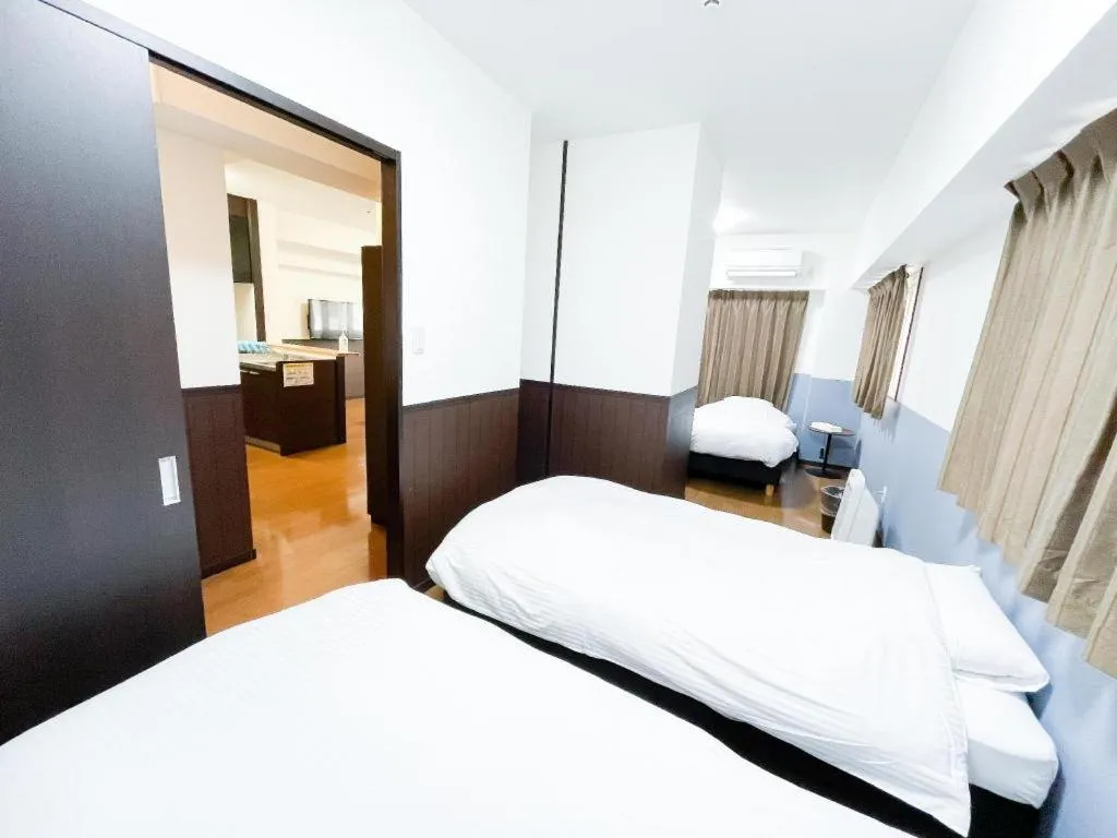 Bed in Villa Coast Nishimachi - Guesthouse in Okinawa