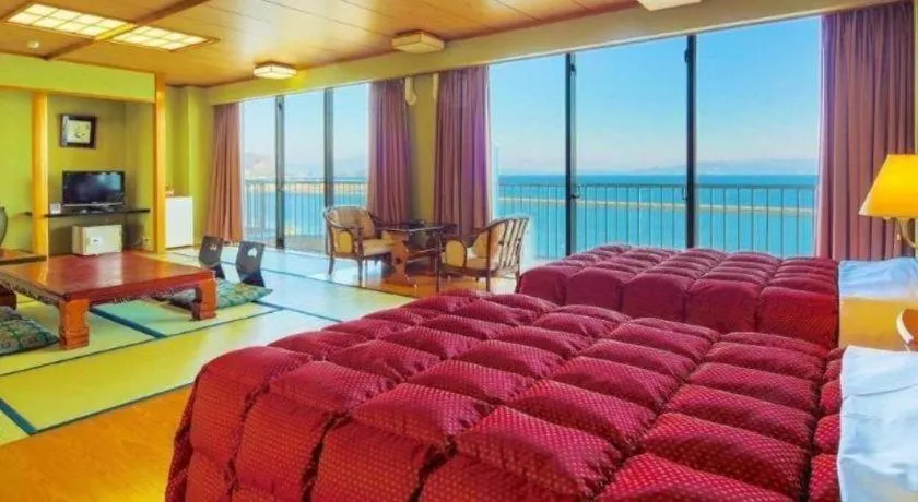 Bed in Ibusuki Onsen Hotel Shougetsu