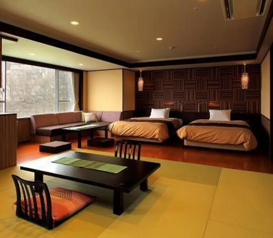 Bed in Hotel Kogure