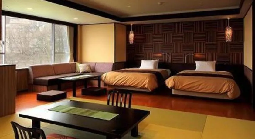 Bed in Hotel Kogure