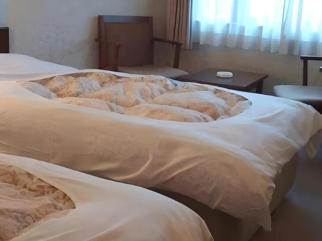 Bed in Sento Otani Hotel