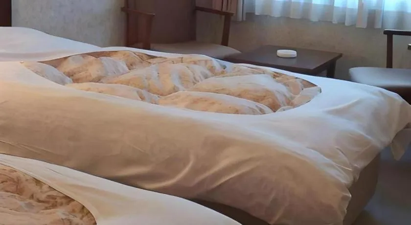 Bed in Sento Otani Hotel