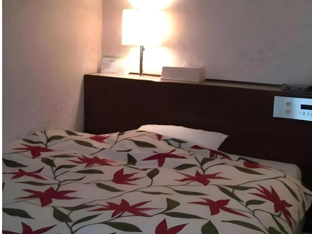 Bed in Sento Otani Hotel