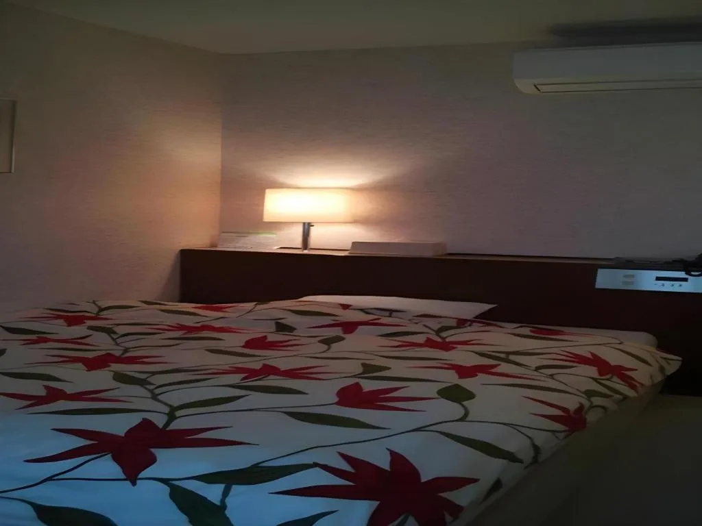 Bed in Sento Otani Hotel