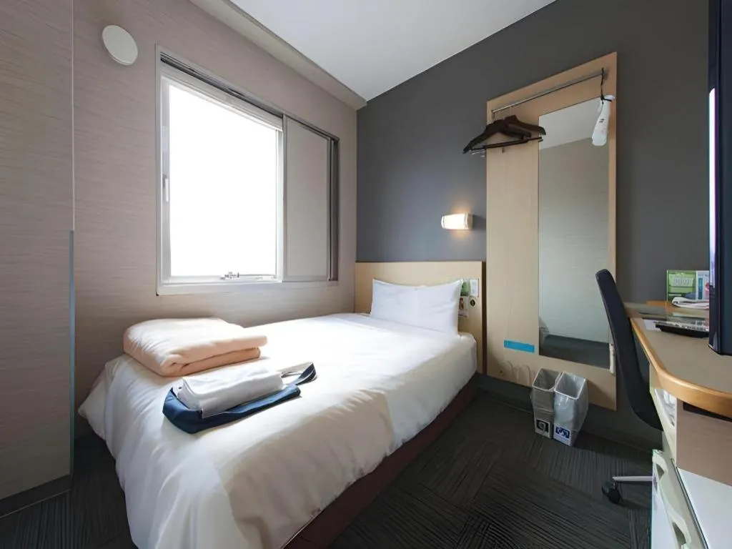 Bed in Super Hotel Arai-Niigata