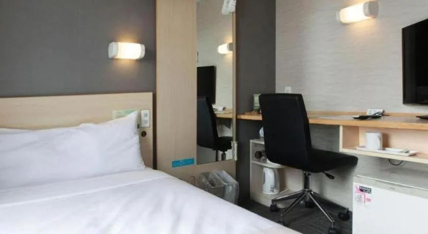 Bed in Super Hotel Arai-Niigata