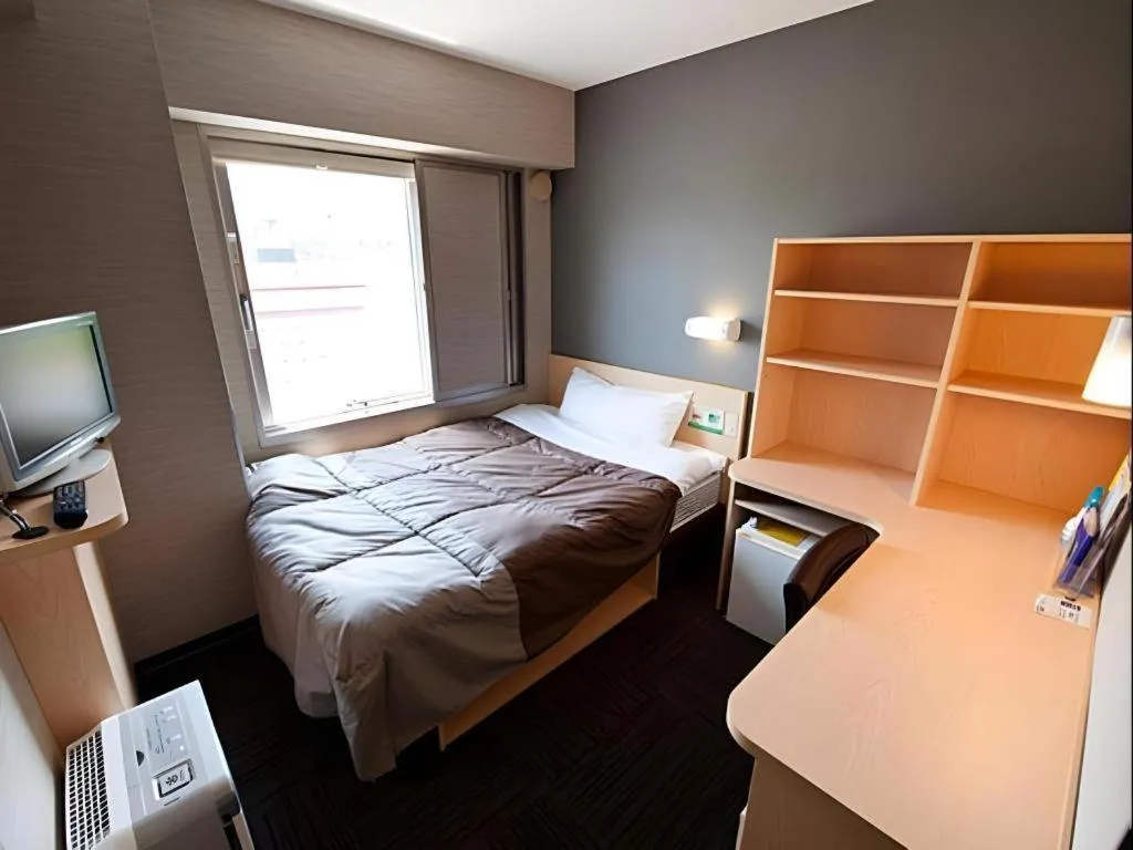 Bed in Super Hotel Arai-Niigata