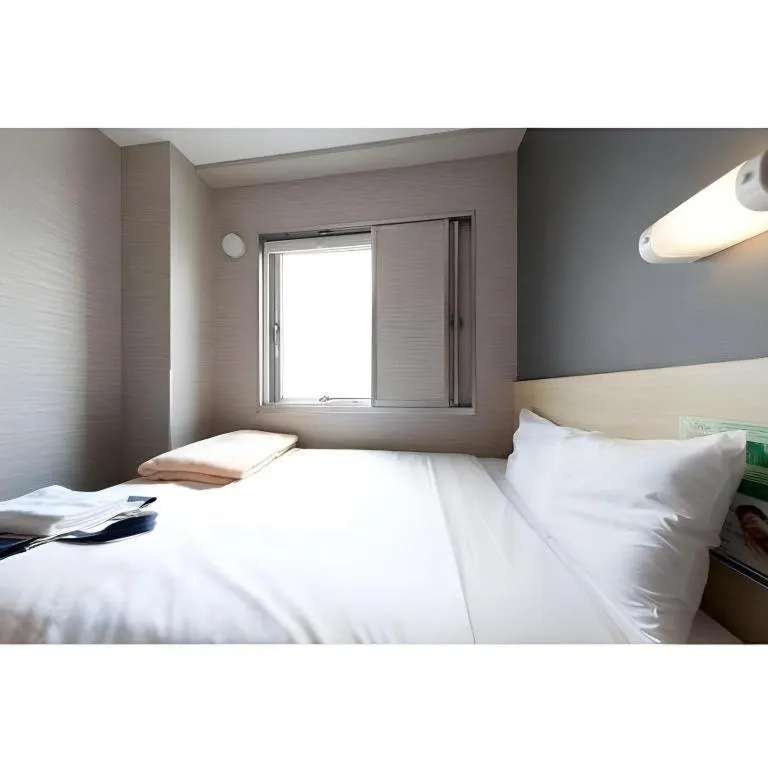 Bed in Super Hotel Arai-Niigata