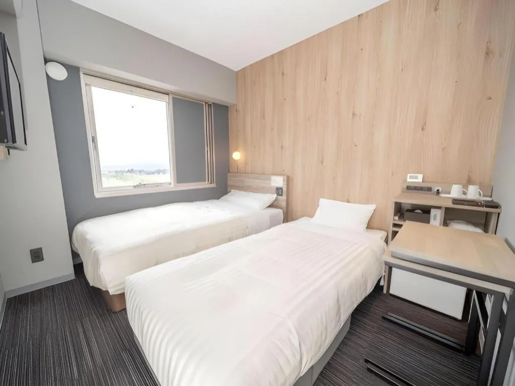 Bed in Super Hotel Arai-Niigata