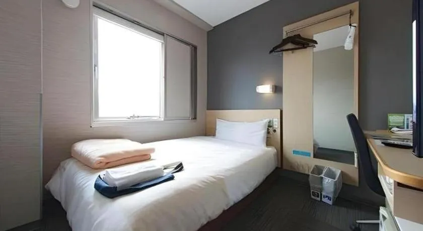 Bed in Super Hotel Arai-Niigata