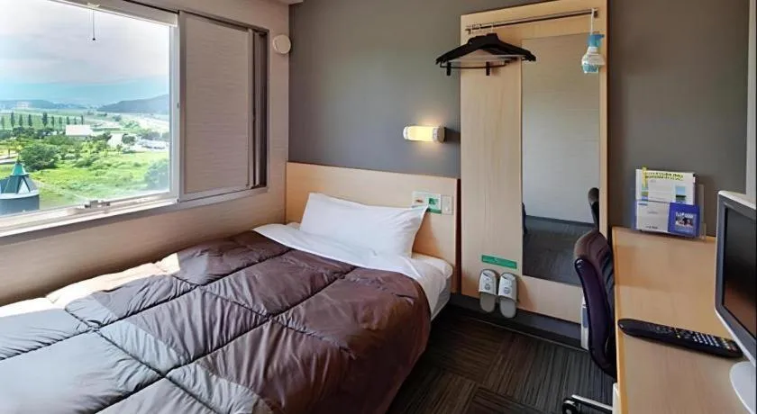 Bed in Super Hotel Arai-Niigata