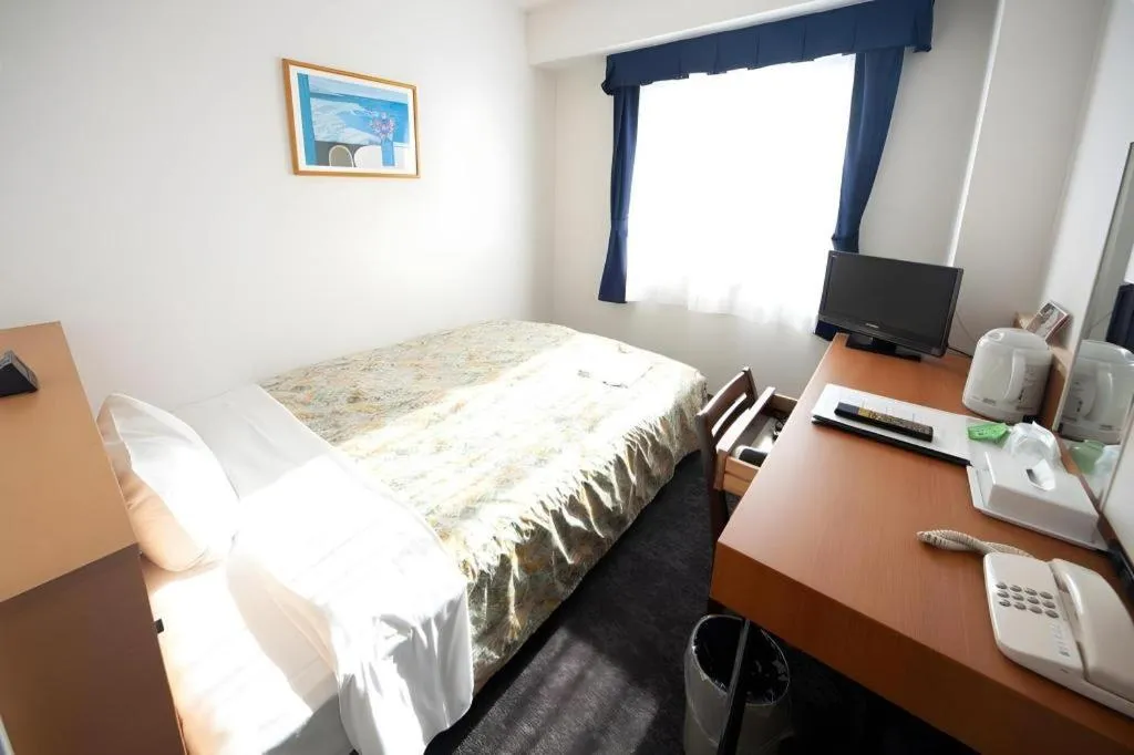 Bed in Hirata Maple Hotel