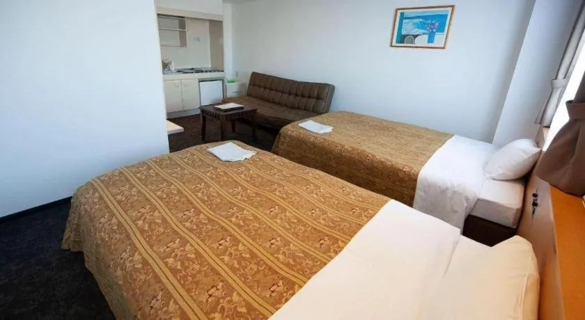 Bed in Hirata Maple Hotel