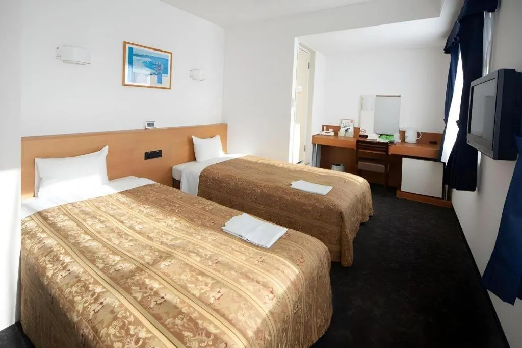 Bed in Hirata Maple Hotel