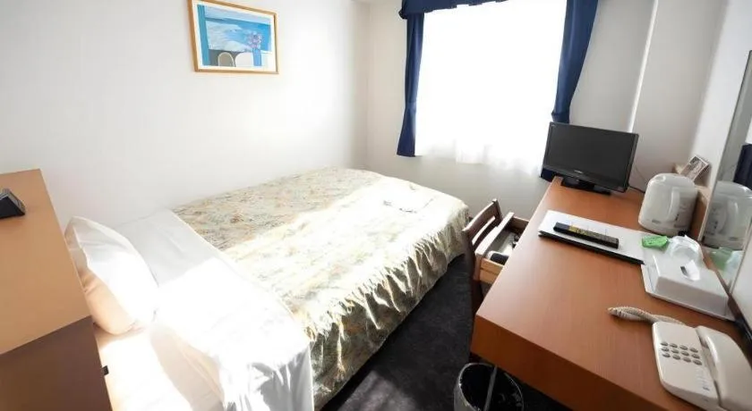 Bed in Hirata Maple Hotel