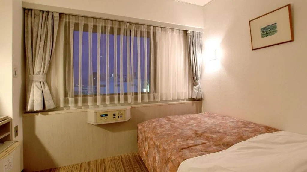 Bed in City Park Hotel Hachinohe