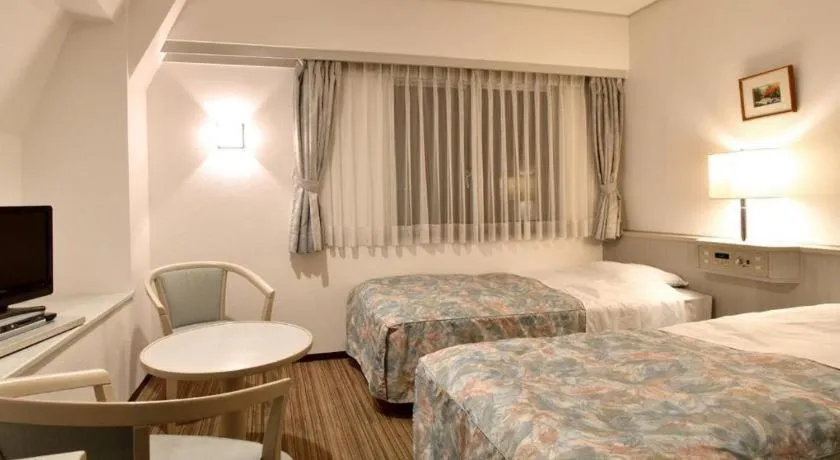 Bed in City Park Hotel Hachinohe