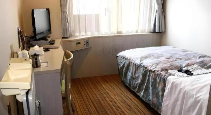 Bed in City Park Hotel Hachinohe