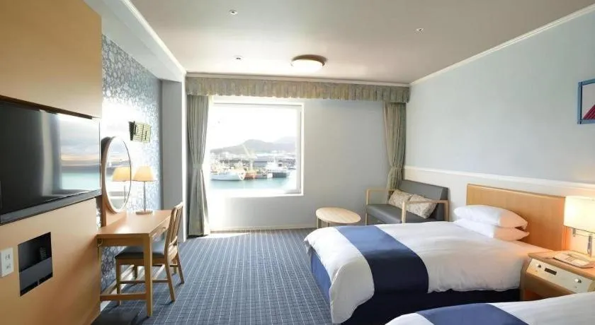 Bed in Green Hill Hotel Onomichi