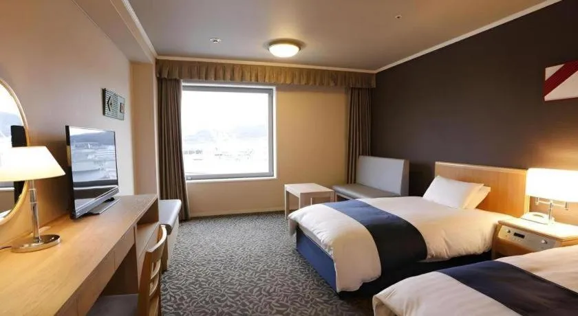 Bed in Green Hill Hotel Onomichi