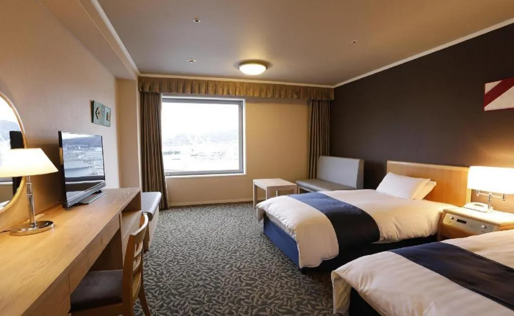 Bed in Green Hill Hotel Onomichi