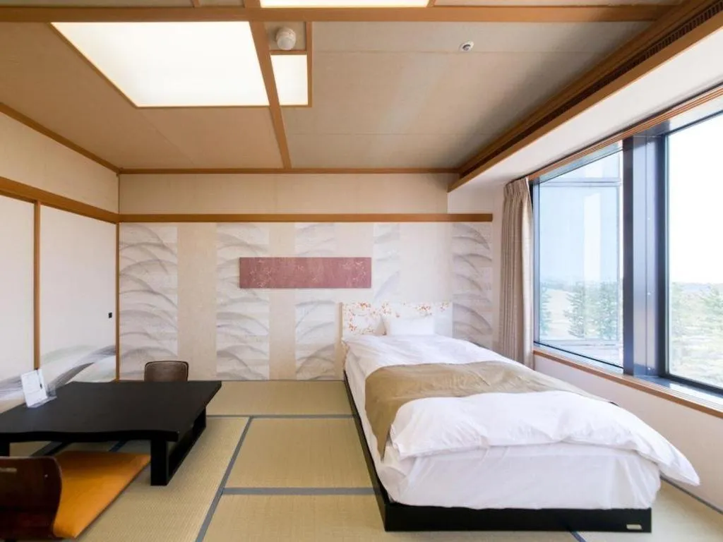 Bed in Centurion Hotel Technoport Fukui- Artificial Radium Hot Spring