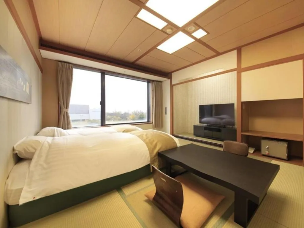 Bed in Centurion Hotel Technoport Fukui- Artificial Radium Hot Spring