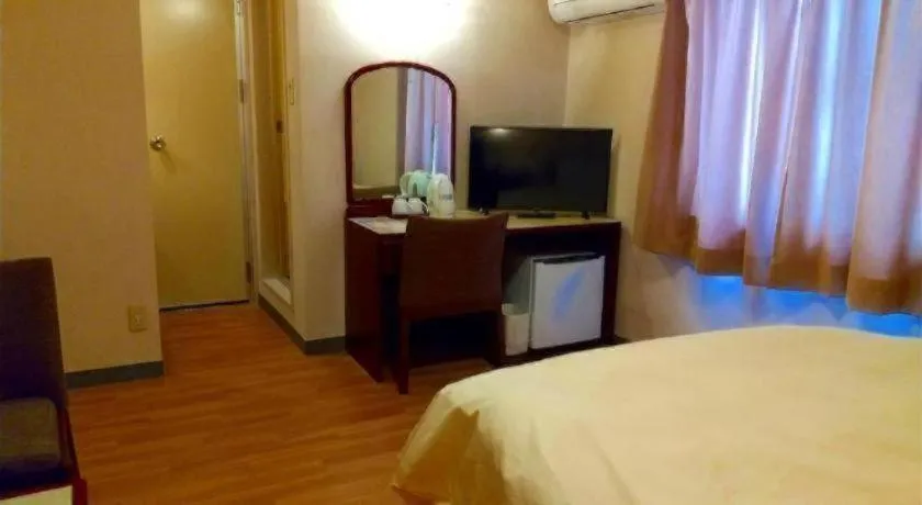 Bed in Ichimanri Hotel Golden Century