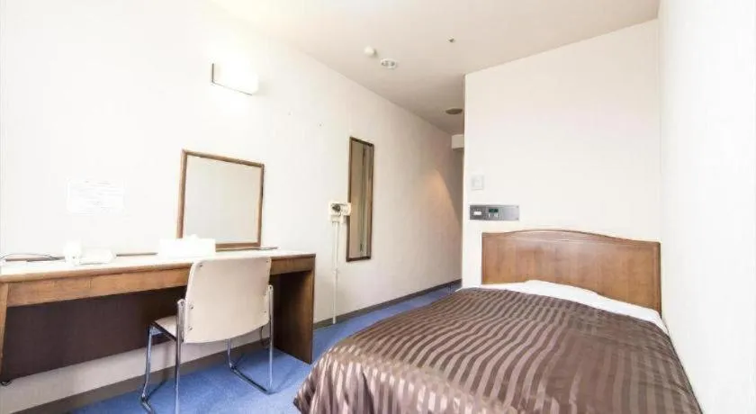 Bed in Ichimanri Hotel Golden Century