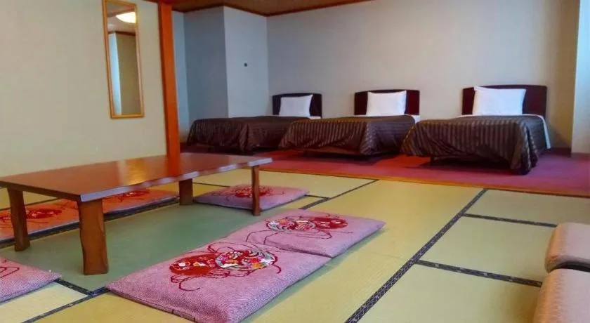 Bed in Ichimanri Hotel Golden Century