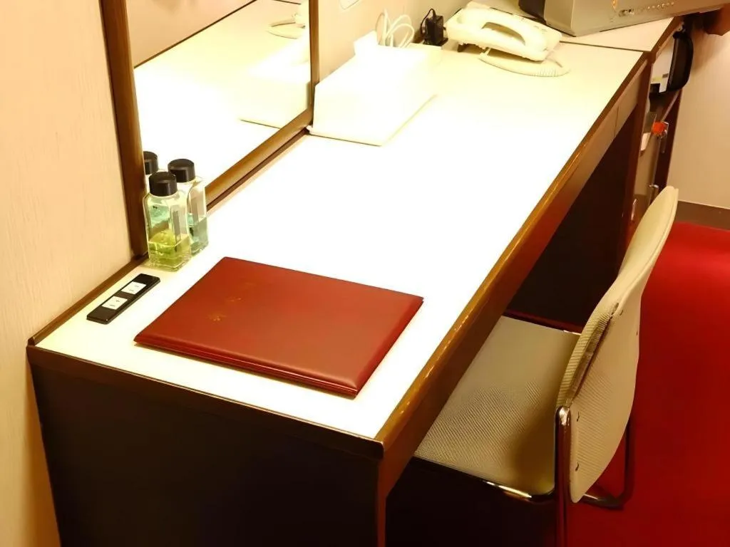 Bed in Ichimanri Hotel Golden Century