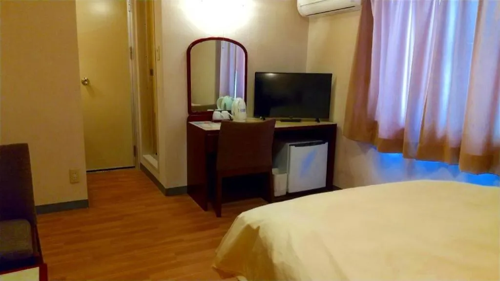 Bed in Ichimanri Hotel Golden Century