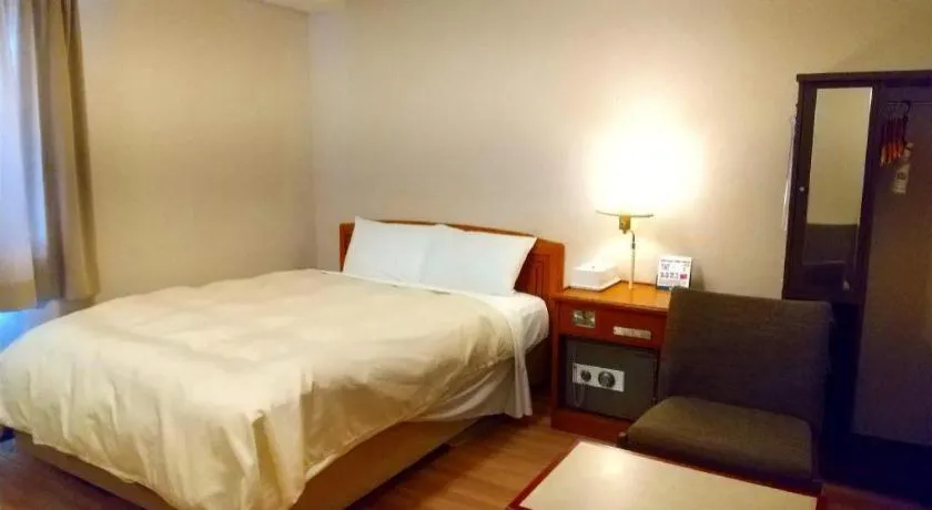 Bed in Ichimanri Hotel Golden Century