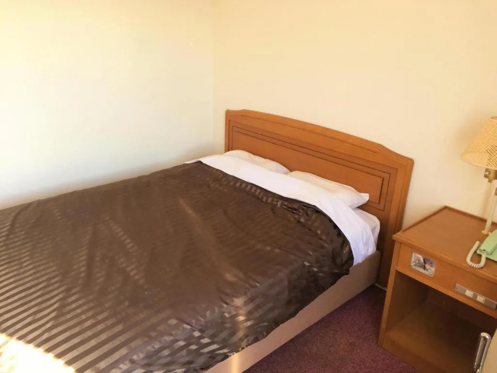 Bed in Ichimanri Hotel Golden Century