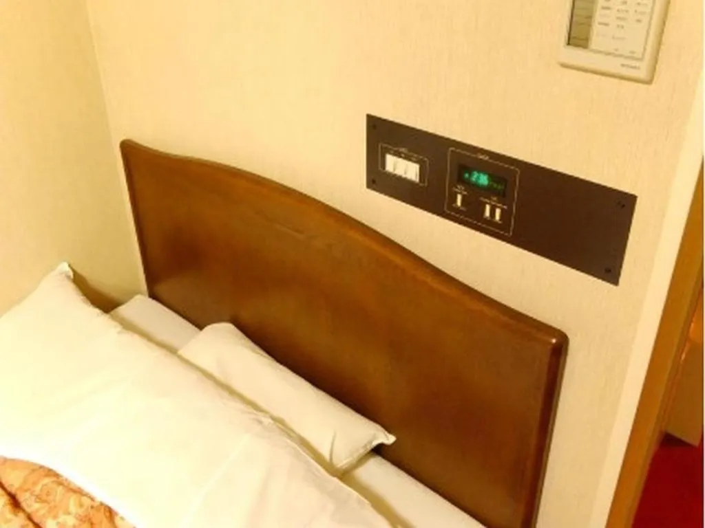 Bed in Ichimanri Hotel Golden Century