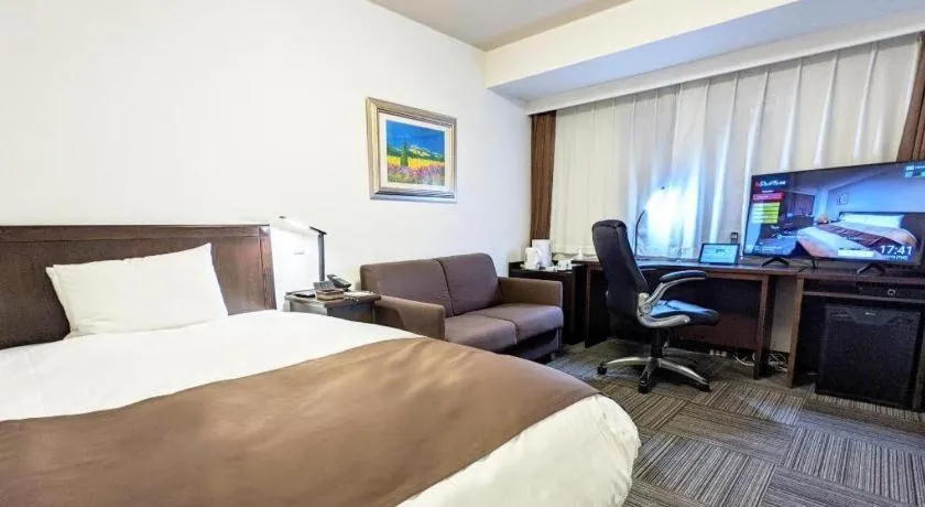 Bed in Hotel Sealuck Pal Takasaki