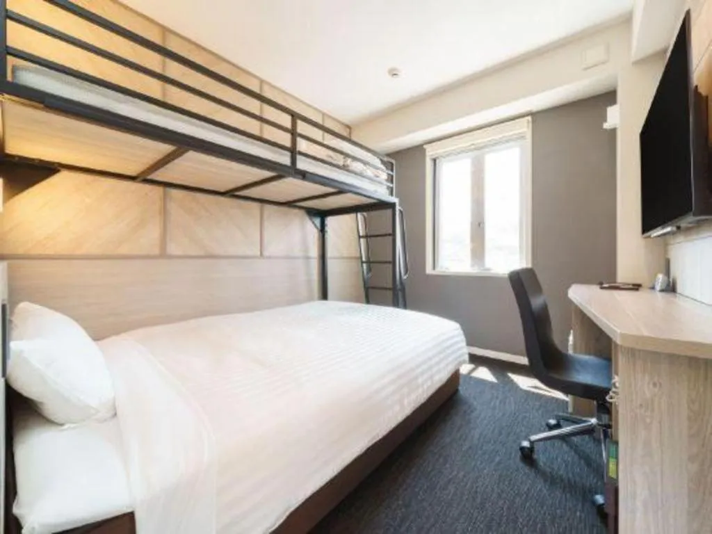 Bed in Super Hotel Satsuma Sendai