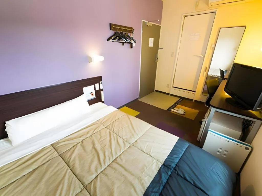 Bed in Super Hotel Satsuma Sendai