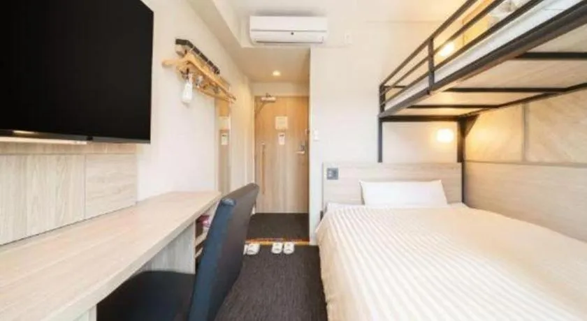 Bed in Super Hotel Satsuma Sendai