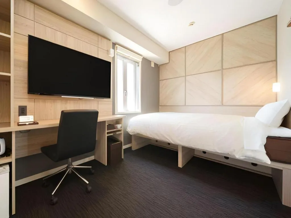 Bed in Super Hotel Satsuma Sendai