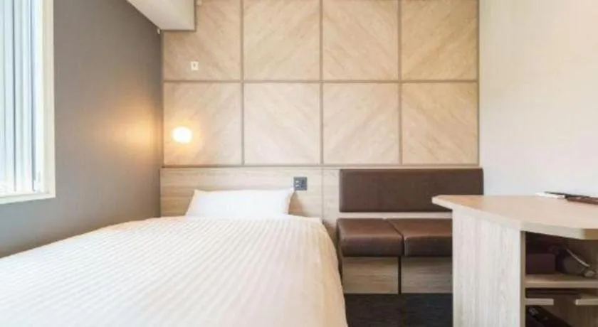 Bed in Super Hotel Satsuma Sendai