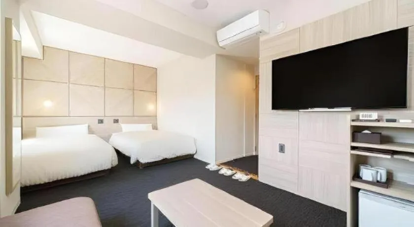 Bed in Super Hotel Satsuma Sendai