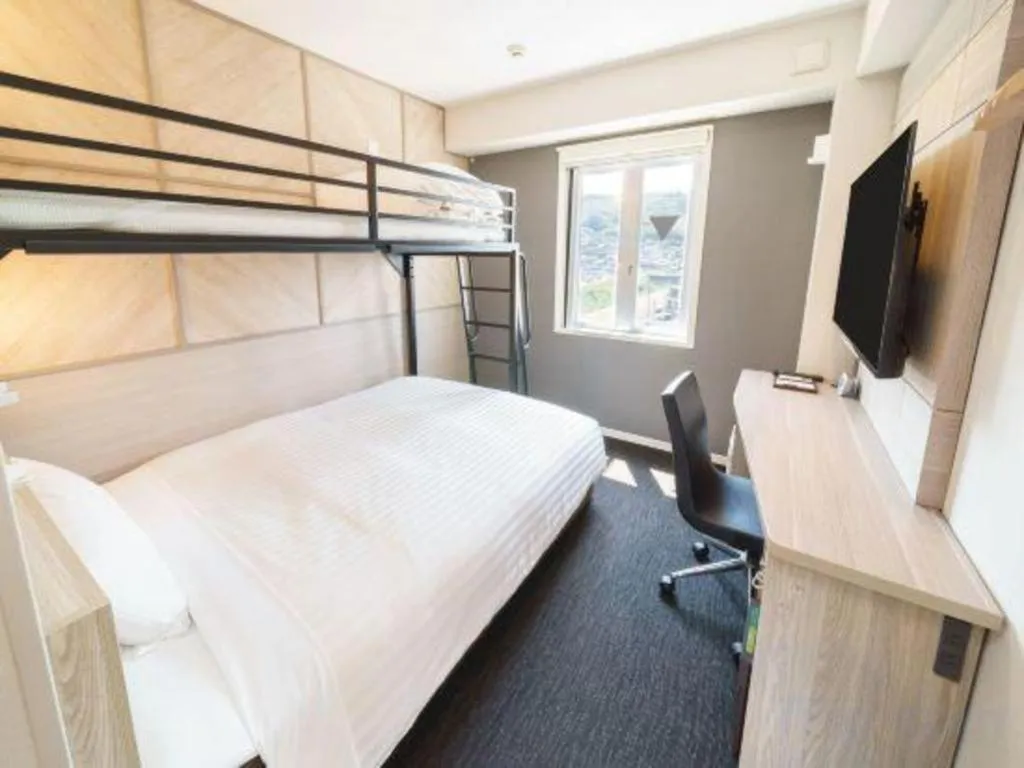 Bed in Super Hotel Satsuma Sendai