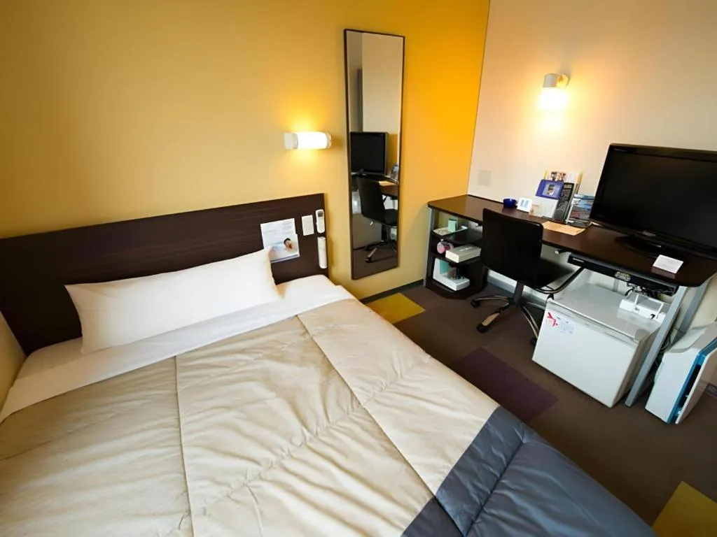 Bed in Super Hotel Satsuma Sendai