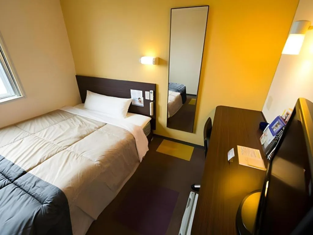 Bed in Super Hotel Satsuma Sendai