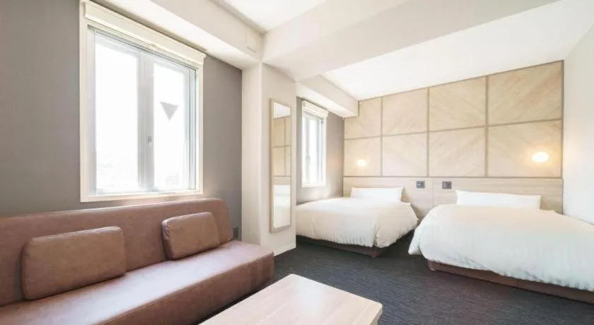 Bed in Super Hotel Satsuma Sendai