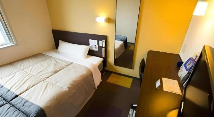 Bed in Super Hotel Satsuma Sendai