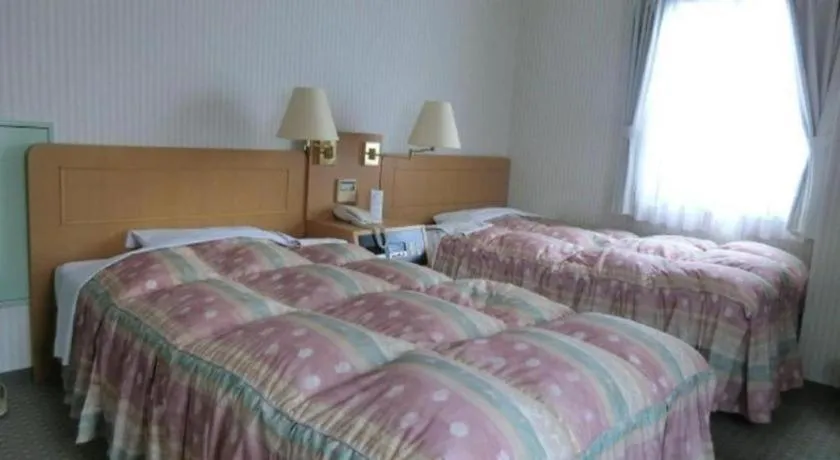 Bed in Hotel Half Time