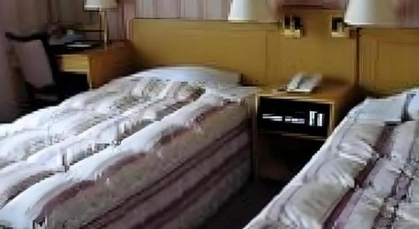 Bed in Hotel Half Time