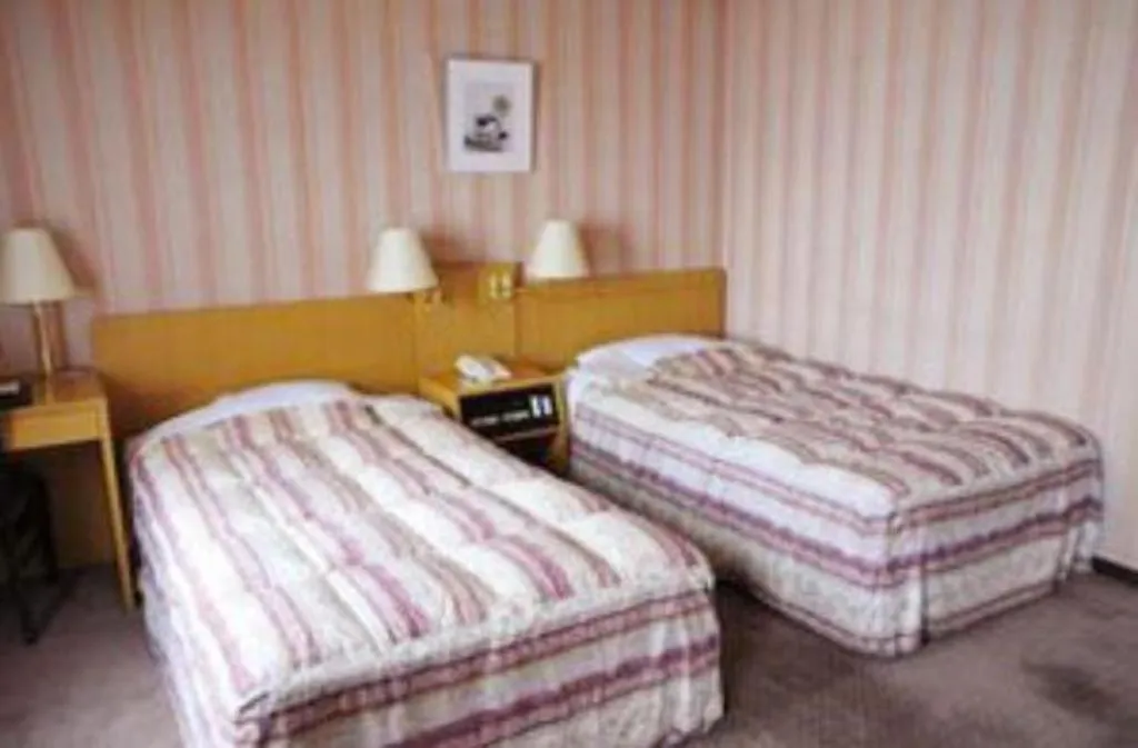 Bed in Hotel Half Time